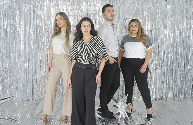 Hombres y muejeres modelando la ropa
