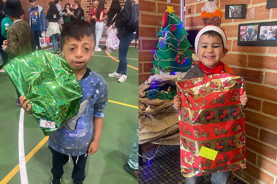 Niños recibiendo regalos del programa de Navidar